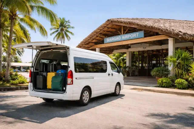 Airport transfer van in Siargao with luggage